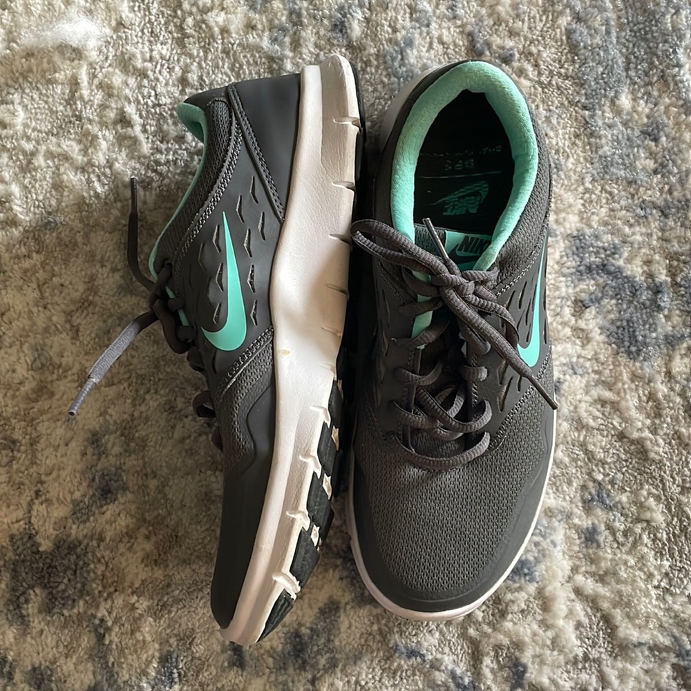 Gray and turquoise Nike sneakers